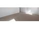 Cozy bedroom features neutral carpeting and ample space at 17319 W Via Dona Rd, Surprise, AZ 85387