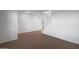 Open concept living room with hardwood floors and a view of the stairway at 17319 W Via Dona Rd, Surprise, AZ 85387