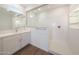 Modern bathroom showcases a glass-enclosed shower with tiled walls and a wood-look floor at 17429 W Via Dona Rd, Surprise, AZ 85387