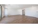 Spacious and bright living area with tile flooring and easy access to other rooms at 17429 W Via Dona Rd, Surprise, AZ 85387