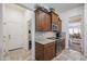 Well-equipped kitchen area with stainless steel appliances, granite counters, and ample storage at 17981 W Agave Rd, Goodyear, AZ 85338