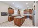 Modern kitchen featuring granite countertops, stainless appliances, and ample cabinet space at 17981 W Agave Rd, Goodyear, AZ 85338
