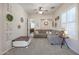 Comfortable living room featuring a sectional sofa, ceiling fan, and neutral decor at 17981 W Agave Rd, Goodyear, AZ 85338