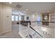 Cozy loft with a comfortable couch, and views of the first floor at 17981 W Agave Rd, Goodyear, AZ 85338