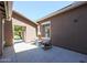 Cozy outdoor patio with comfortable seating, perfect for relaxing and enjoying the fresh air at 17981 W Agave Rd, Goodyear, AZ 85338