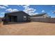 The expansive backyard offers ample space with potential for landscaping or outdoor activities at 18256 W La Senda Dr, Surprise, AZ 85387