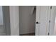 A walk-in closet with shelving offers storage for shoes, accessories and more at 18256 W La Senda Dr, Surprise, AZ 85387