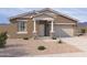 Charming single-story home featuring a neutral color palette and well-manicured landscaping at 18260 W Camino De Oro --, Surprise, AZ 85387