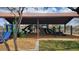 Covered playground featuring slides, climbing structures, and soft landing surfaces for enjoyment at 18261 W Camino De Oro --, Surprise, AZ 85387