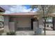 Community restrooms with landscaping near pool, well maintained on a sunny day at 18261 W Camino De Oro --, Surprise, AZ 85387
