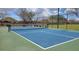 Community tennis court well maintained on a sunny day at 18261 W Camino De Oro --, Surprise, AZ 85387