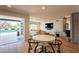 Bright living room showcasing a fireplace, backyard views, and seamless indoor-outdoor living at 20 W Canterbury Ln, Phoenix, AZ 85023