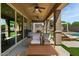 Inviting covered patio with comfortable seating, ceiling fans, and access to backyard at 20483 E Mockingbird Dr, Queen Creek, AZ 85142
