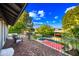 Spacious balcony overlooking the backyard pool and lush landscaping, perfect for relaxation at 2066 E Lockwood St, Mesa, AZ 85213