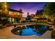 Beautiful pool area with an inviting pool and ambient lighting, creating a relaxing backyard retreat at 2066 E Lockwood St, Mesa, AZ 85213