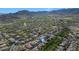 Scenic community aerial view with mountain views, golf course, and lush green landscape at 20791 W Main St, Buckeye, AZ 85396