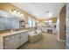 Bright bathroom with dual vanities, soaking tub, and walk-in shower at 20791 W Main St, Buckeye, AZ 85396