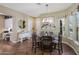 View of breakfast nook with table, chairs, and a bay window at 20791 W Main St, Buckeye, AZ 85396