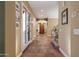 Inviting foyer with tile flooring, arched doorways, and elegant decor at 20791 W Main St, Buckeye, AZ 85396