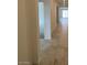 Bright hallway featuring neutral tile flooring and an open layout at 25354 W Bowker St, Buckeye, AZ 85326
