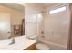 Bathroom featuring a shower and tub combination with white tile and a single sink vanity at 2749 S Powell Rd, Apache Junction, AZ 85119