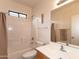 Clean, well-lit bathroom with a shower-tub combo, toilet and a single sink vanity at 2749 S Powell Rd, Apache Junction, AZ 85119