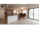 Well-lit kitchen with an island and open access to the breakfast nook at 2749 S Powell Rd, Apache Junction, AZ 85119