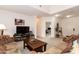 Cozy living room featuring a television and neutral carpet at 2749 S Powell Rd, Apache Junction, AZ 85119