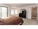 Comfortable main bedroom with lots of natural light and outside access at 2749 S Powell Rd, Apache Junction, AZ 85119