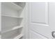 Walk-in closet features shelving and a door for additional storage at 28259 N Chalcocite St, San Tan Valley, AZ 85143