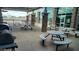 Inviting community patio with grills, picnic tables, and covered structure at 28259 N Chalcocite St, San Tan Valley, AZ 85143