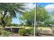 Picturesque green space showcasing landscaping with mature trees and shrubs at 28259 N Chalcocite St, San Tan Valley, AZ 85143