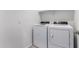 Bright laundry area with white appliances at 28259 N Chalcocite St, San Tan Valley, AZ 85143