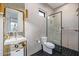 Sleek bathroom with modern fixtures, glass shower, and stylish mirror at 3425 N 50Th Pl, Phoenix, AZ 85018