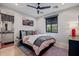 Comfortable bedroom with neutral tones and a large window with natural light at 3425 N 50Th Pl, Phoenix, AZ 85018