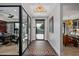 Stunning entryway with tile floors, modern light fixtures, and a view into the rest of the home at 3425 N 50Th Pl, Phoenix, AZ 85018