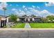 Stunning home with a perfectly manicured lawn, attractive landscaping, and sleek modern design at 3425 N 50Th Pl, Phoenix, AZ 85018