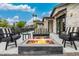 Inviting patio features a stylish firepit and comfortable seating, perfect for entertaining at 3425 N 50Th Pl, Phoenix, AZ 85018