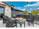 Outdoor patio features a modern firepit, perfect for relaxing and entertaining on cool nights at 3425 N 50Th Pl, Phoenix, AZ 85018