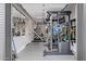 Home gym with various workout machines and mirrored wall at 3425 N 50Th Pl, Phoenix, AZ 85018