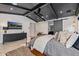 Expansive main bedroom with a coffered ceiling, sliding barn door, and a custom media center at 3425 N 50Th Pl, Phoenix, AZ 85018
