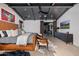 Luxury main bedroom with a leather bed, dark wood ceiling, and sliding glass doors to the outdoor patio at 3425 N 50Th Pl, Phoenix, AZ 85018