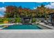 Backyard pool featuring a covered outdoor kitchen, dining and barbecue area at 3425 N 50Th Pl, Phoenix, AZ 85018