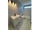 Bathroom features updated fixtures, vanity, and a tub at 3840 N 43Rd Ave # 71, Phoenix, AZ 85031