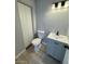Bathroom features modern vanity, toilet, and updated fixtures at 3840 N 43Rd Ave # 71, Phoenix, AZ 85031