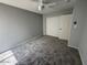Bedroom features closet and neutral carpeting at 3840 N 43Rd Ave # 71, Phoenix, AZ 85031