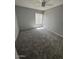 Bedroom features a window and neutral carpeting at 3840 N 43Rd Ave # 71, Phoenix, AZ 85031