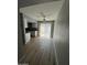 Bright dining area and kitchen featuring new floors and natural light at 3840 N 43Rd Ave # 71, Phoenix, AZ 85031
