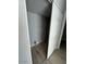 Spacious laundry room featuring tile flooring, ample lighting, and a large closet at 3840 N 43Rd Ave # 71, Phoenix, AZ 85031