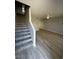Spacious living room with new floors extending to the staircase at 3840 N 43Rd Ave # 71, Phoenix, AZ 85031